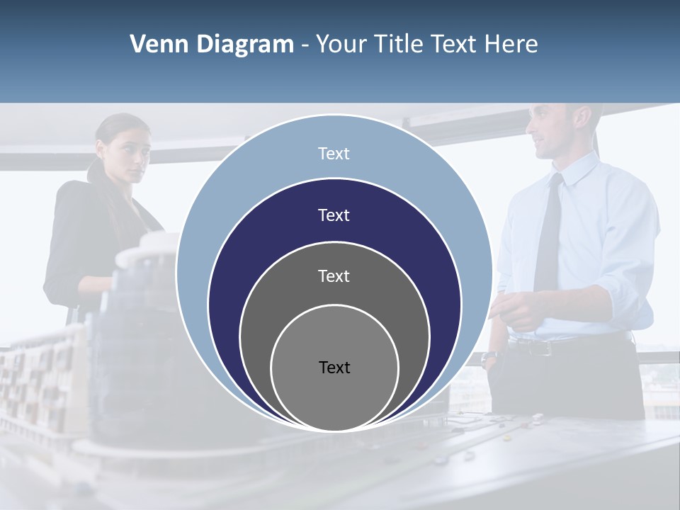 A Group Of People Standing Around A Model Of A Building PowerPoint Template