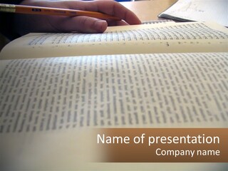 A Person Writing On A Book With A Pencil PowerPoint Template