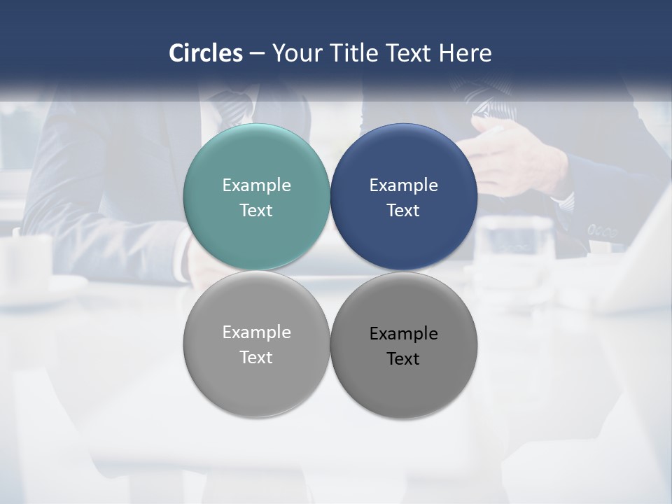 Two Men Sitting At A Table Looking At A Tablet PowerPoint Template