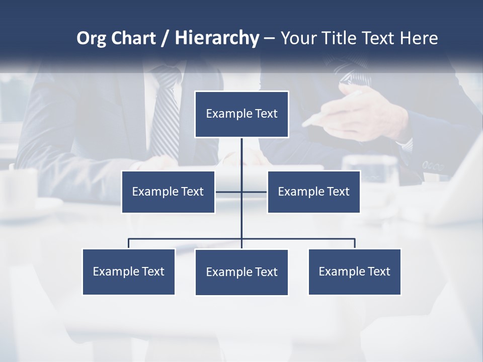 Two Men Sitting At A Table Looking At A Tablet PowerPoint Template