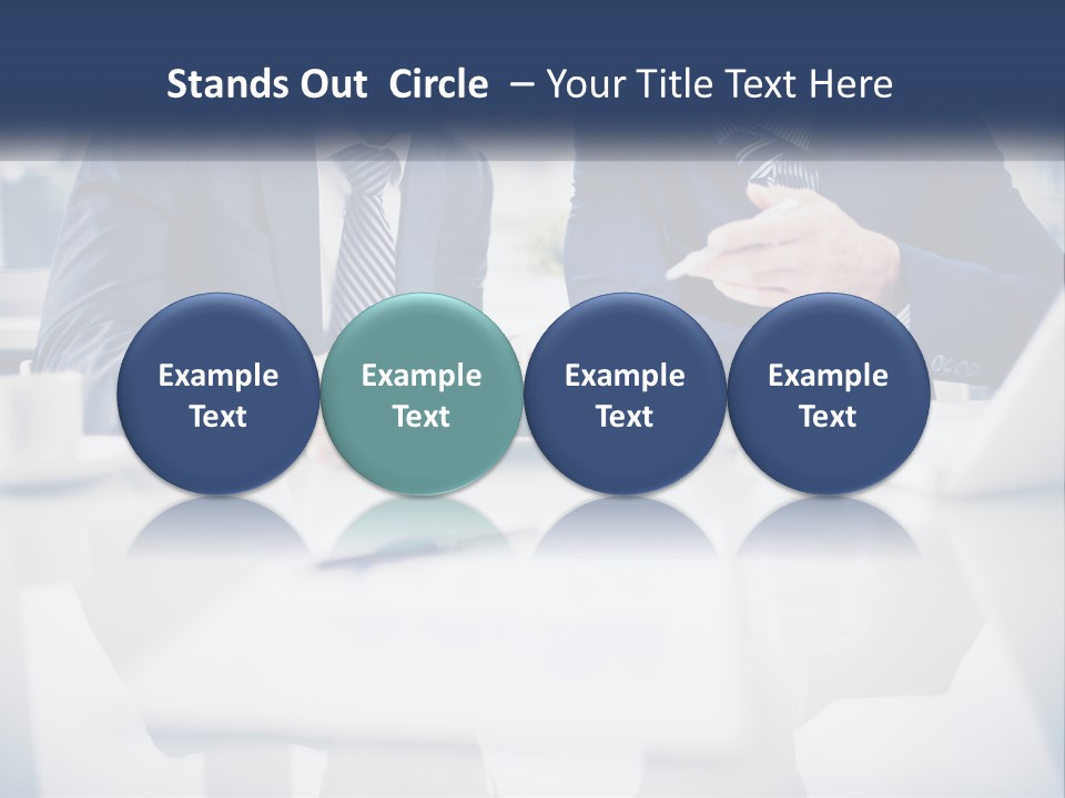 Two Men Sitting At A Table Looking At A Tablet PowerPoint Template