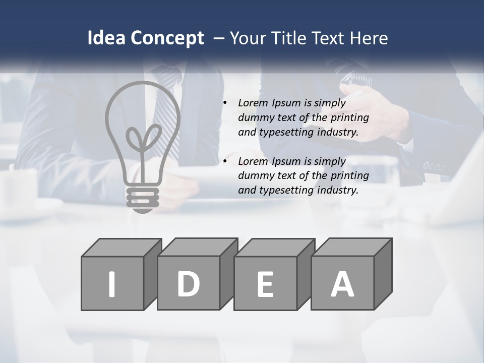 Two Men Sitting At A Table Looking At A Tablet PowerPoint Template