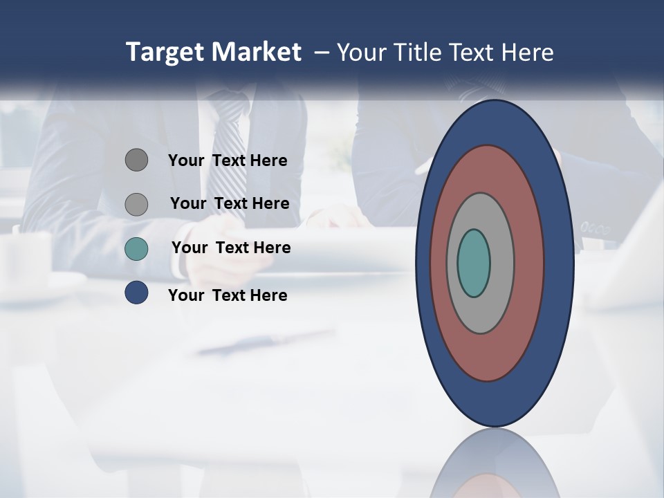 Two Men Sitting At A Table Looking At A Tablet PowerPoint Template