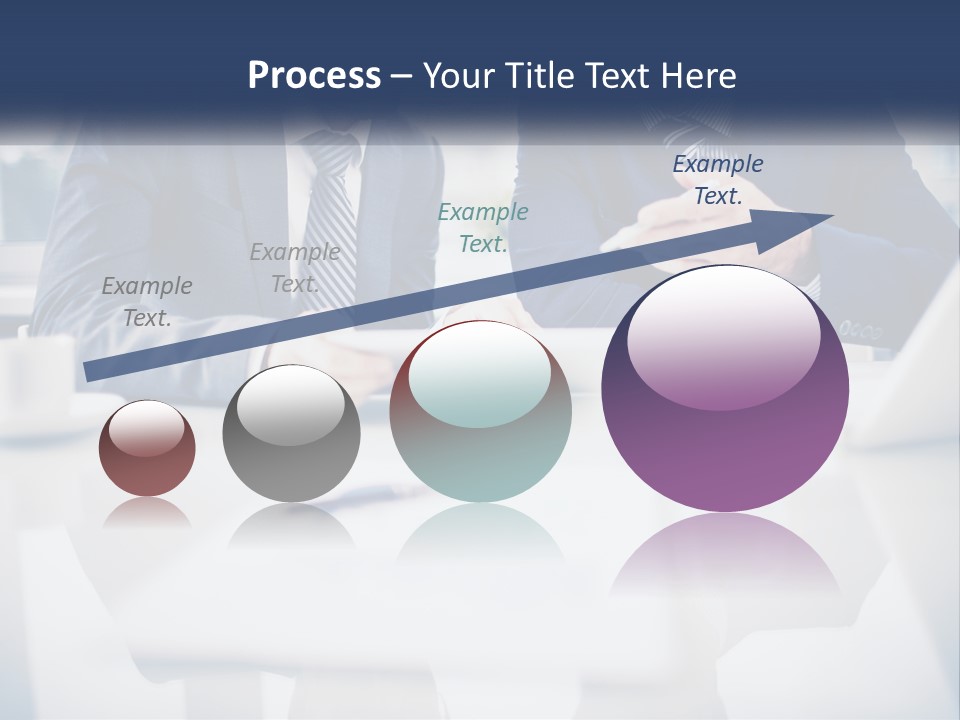 Two Men Sitting At A Table Looking At A Tablet PowerPoint Template