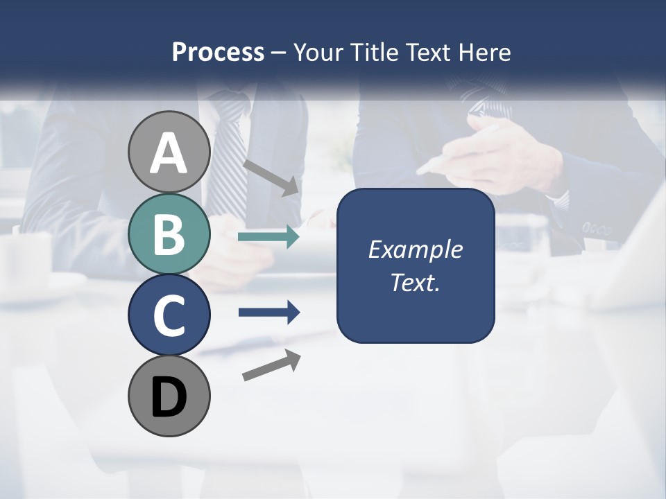 Two Men Sitting At A Table Looking At A Tablet PowerPoint Template