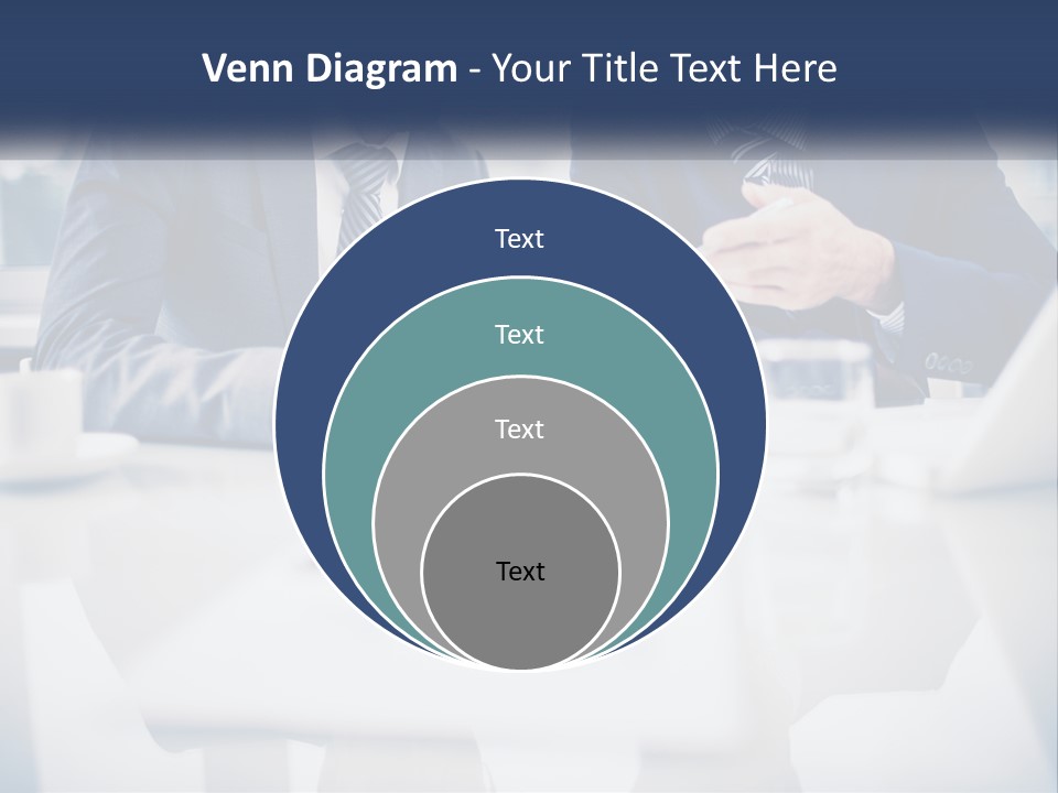 Two Men Sitting At A Table Looking At A Tablet PowerPoint Template