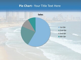 A Beach With A City In The Background PowerPoint Template