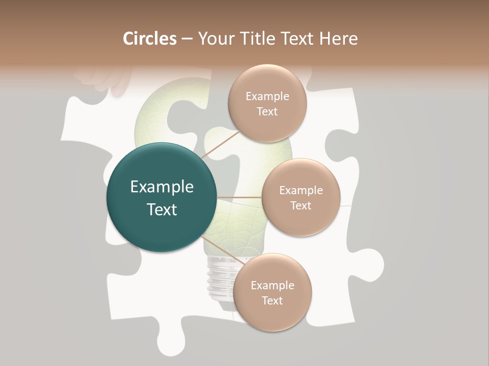 A Person Holding A Piece Of Puzzle With A Light Bulb PowerPoint Template