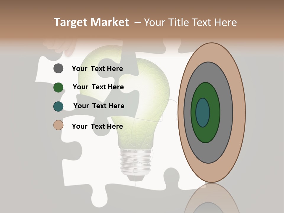 A Person Holding A Piece Of Puzzle With A Light Bulb PowerPoint Template
