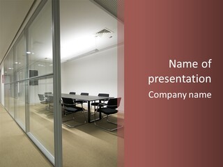 A Conference Room With A Table And Chairs PowerPoint Template