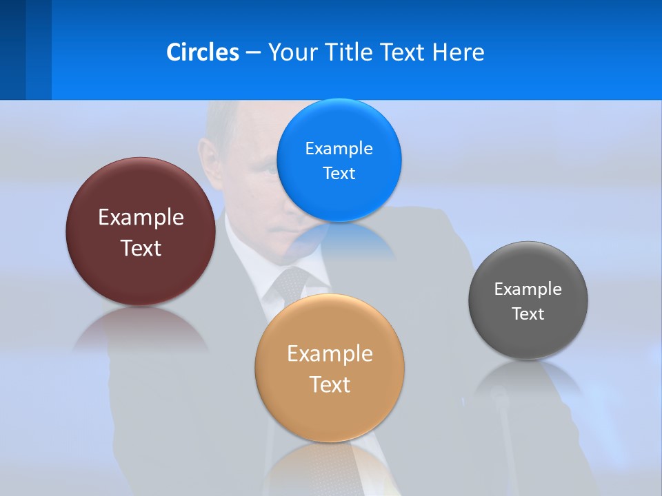 A Man In A Suit And Tie Sitting At A Table PowerPoint Template