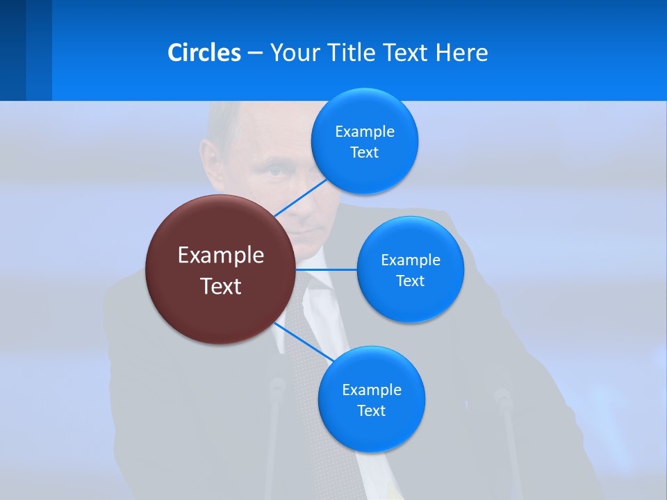 A Man In A Suit And Tie Sitting At A Table PowerPoint Template