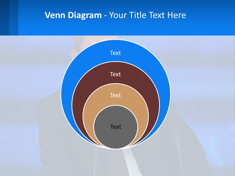 A Man In A Suit And Tie Sitting At A Table PowerPoint Template