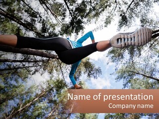 A Woman Doing A Handstand On A Tree Powerpoint Presentation PowerPoint Template