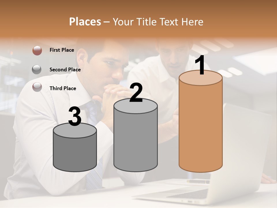 Two Men Sitting At A Table Looking At A Laptop PowerPoint Template