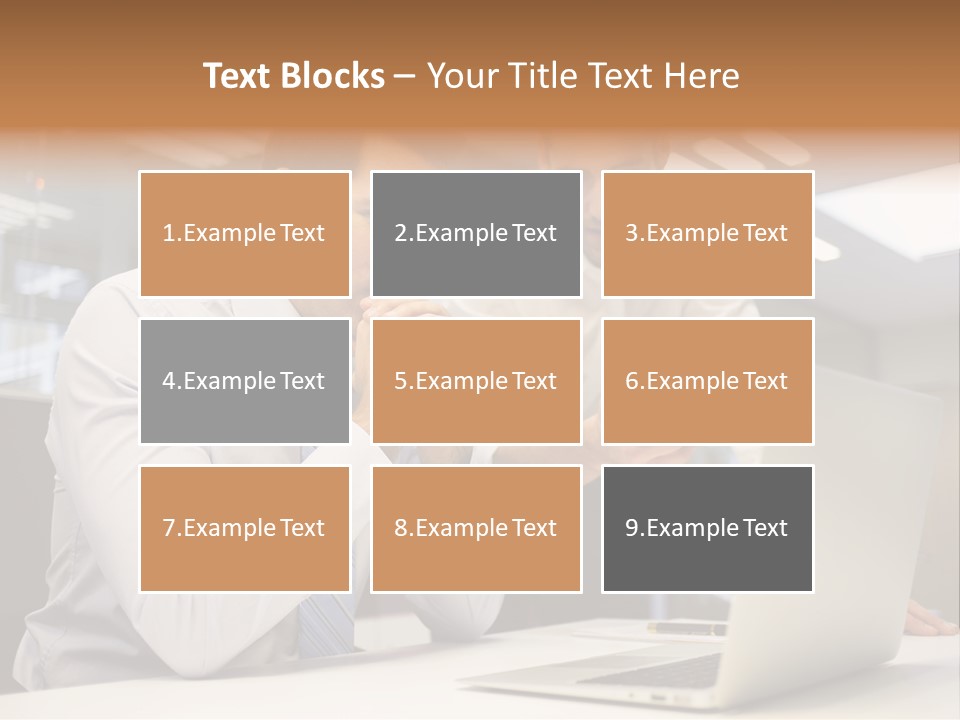 Two Men Sitting At A Table Looking At A Laptop PowerPoint Template