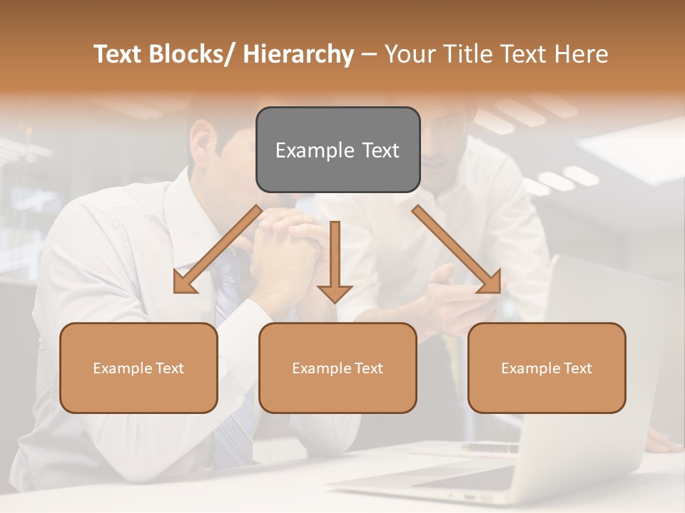 Two Men Sitting At A Table Looking At A Laptop PowerPoint Template
