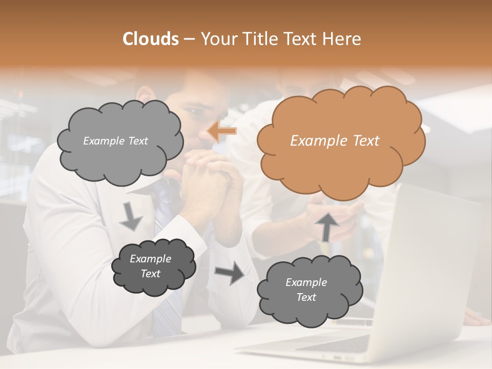 Two Men Sitting At A Table Looking At A Laptop PowerPoint Template