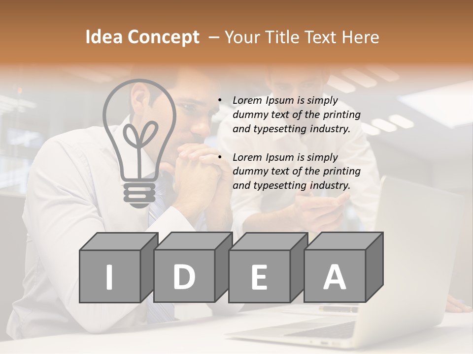 Two Men Sitting At A Table Looking At A Laptop PowerPoint Template