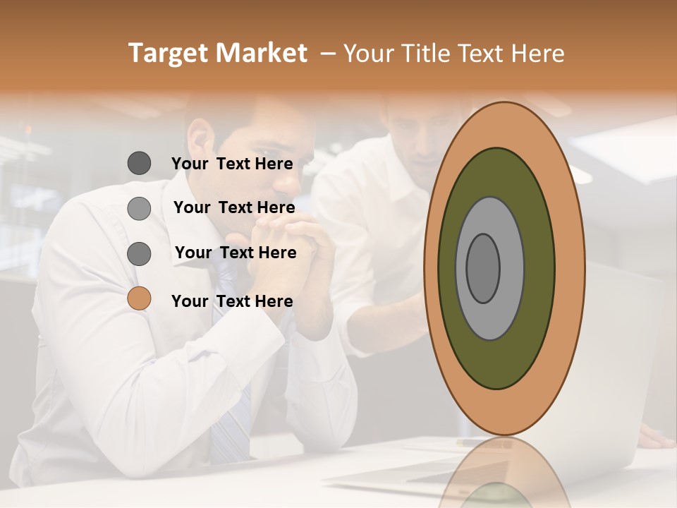 Two Men Sitting At A Table Looking At A Laptop PowerPoint Template