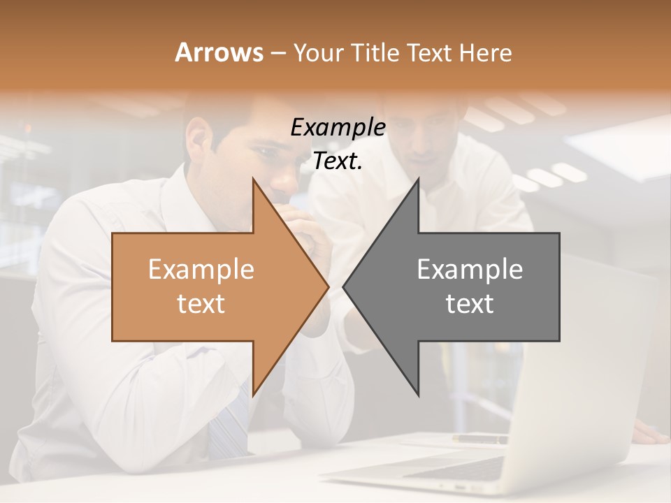Two Men Sitting At A Table Looking At A Laptop PowerPoint Template