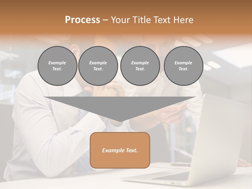 Two Men Sitting At A Table Looking At A Laptop PowerPoint Template