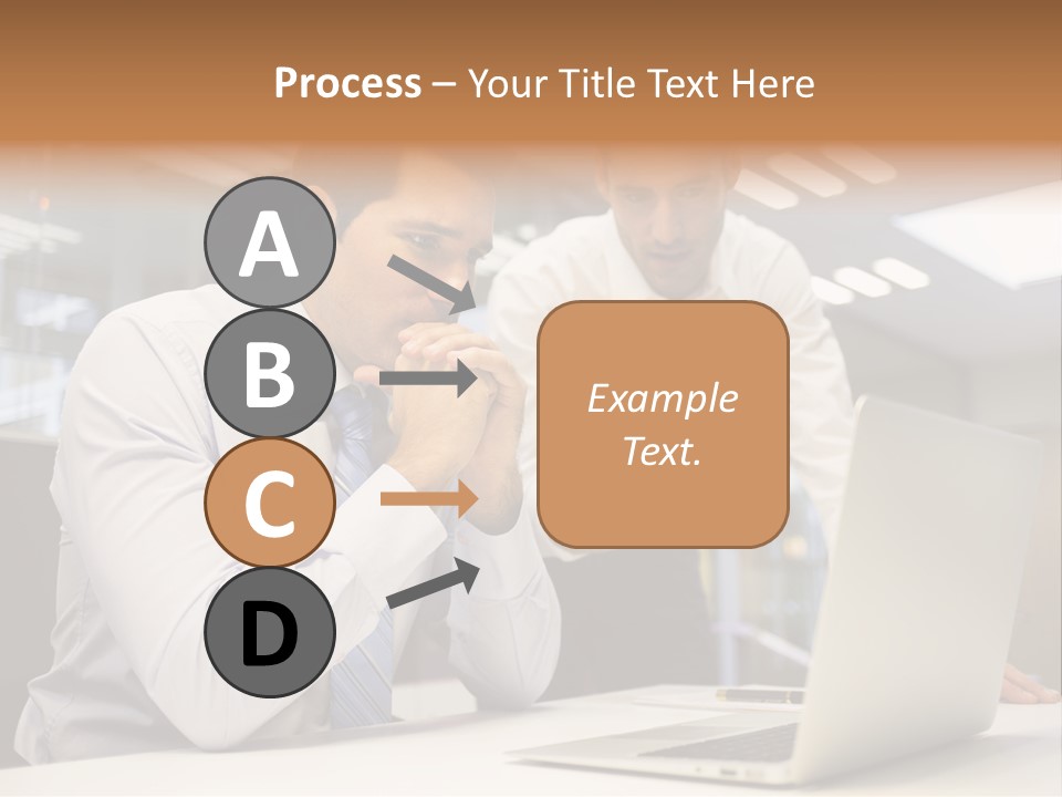 Two Men Sitting At A Table Looking At A Laptop PowerPoint Template