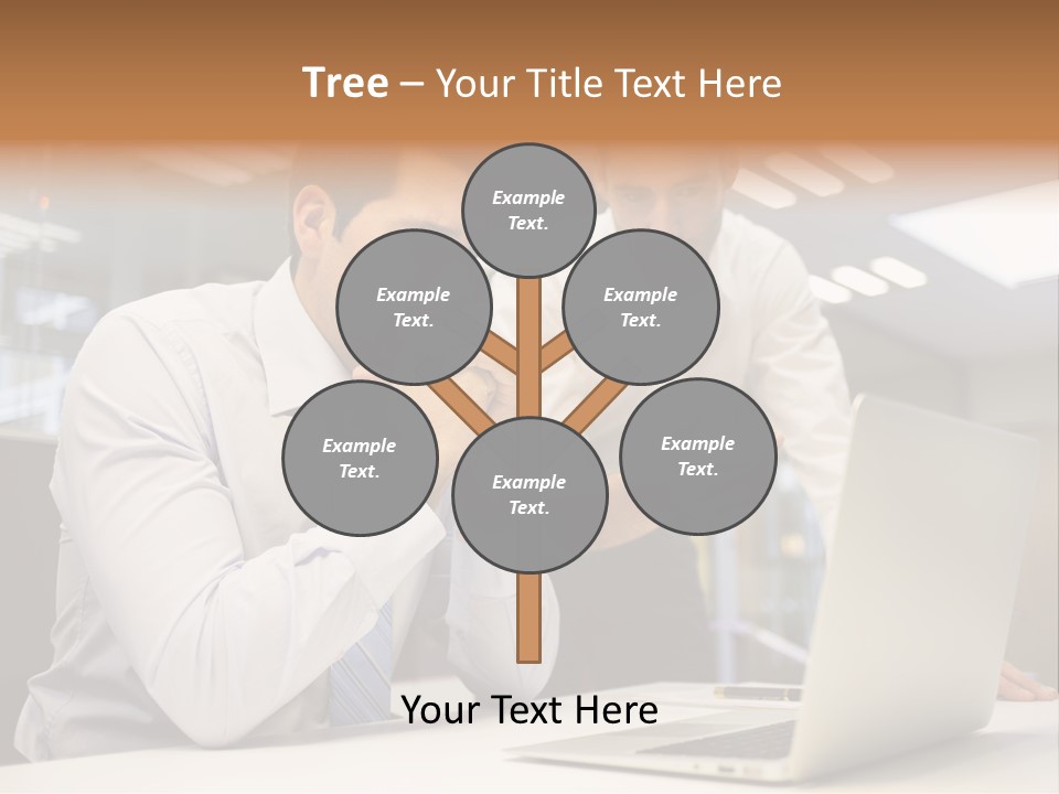 Two Men Sitting At A Table Looking At A Laptop PowerPoint Template