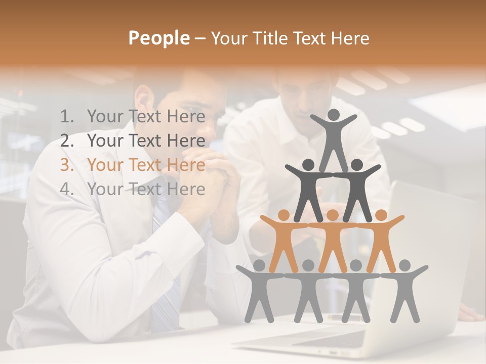 Two Men Sitting At A Table Looking At A Laptop PowerPoint Template