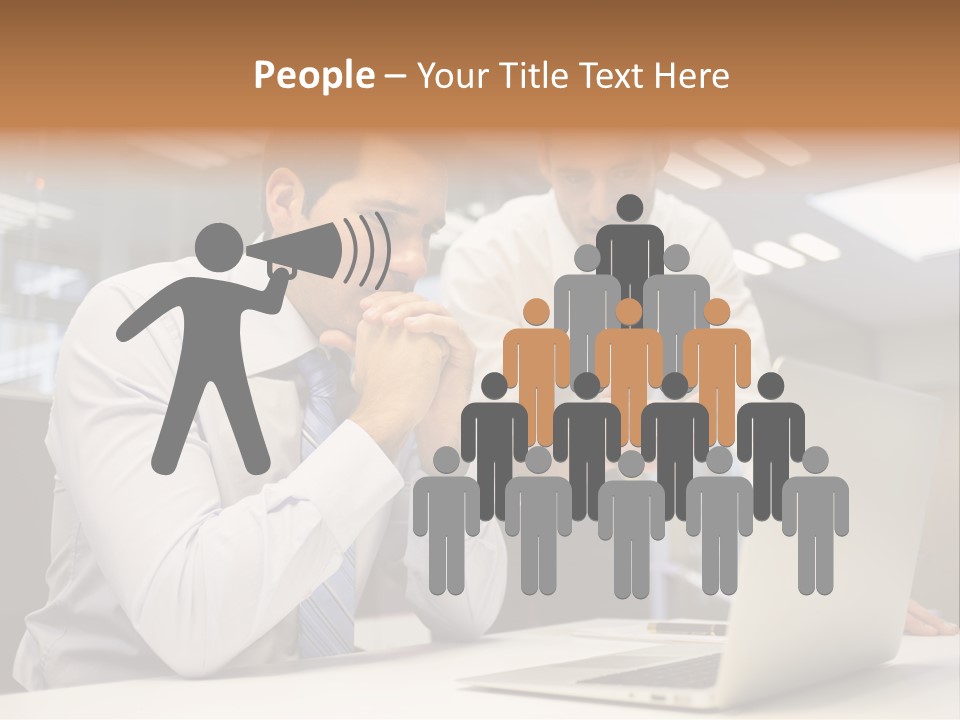 Two Men Sitting At A Table Looking At A Laptop PowerPoint Template