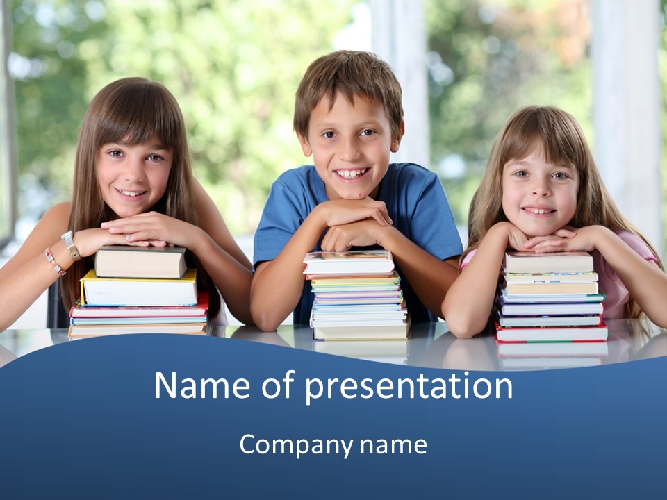 A Group Of Children Sitting At A Table With Books PowerPoint Template