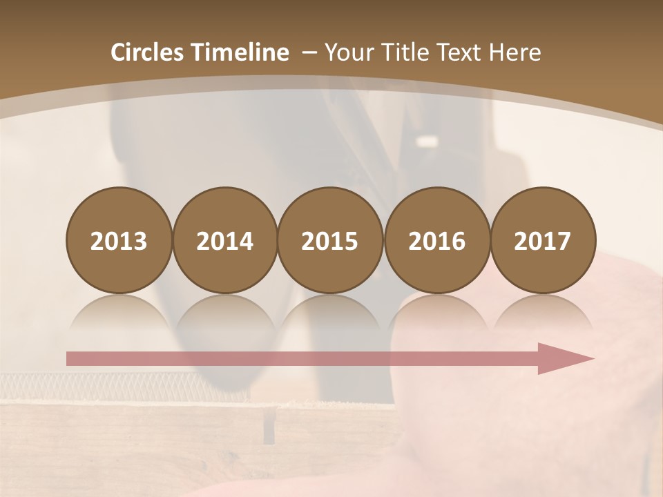 A Person Using A Circular Saw To Cut A Piece Of Wood PowerPoint Template