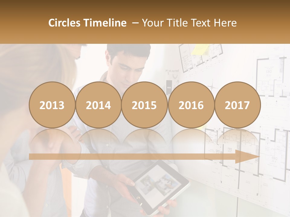 A Man And Woman Looking At A Tablet Screen PowerPoint Template