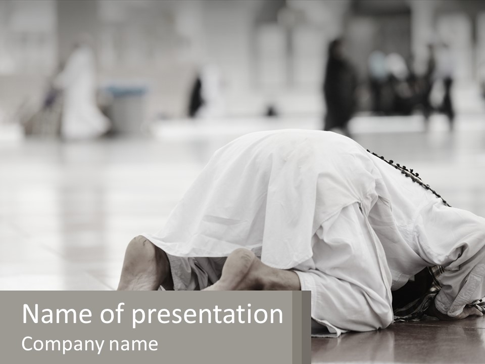 A Man Laying On The Ground With His Head In His Hands PowerPoint Template