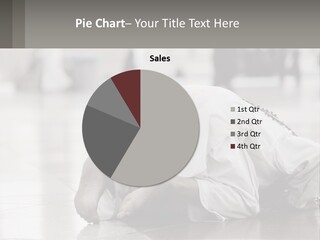 A Man Laying On The Ground With His Head In His Hands PowerPoint Template