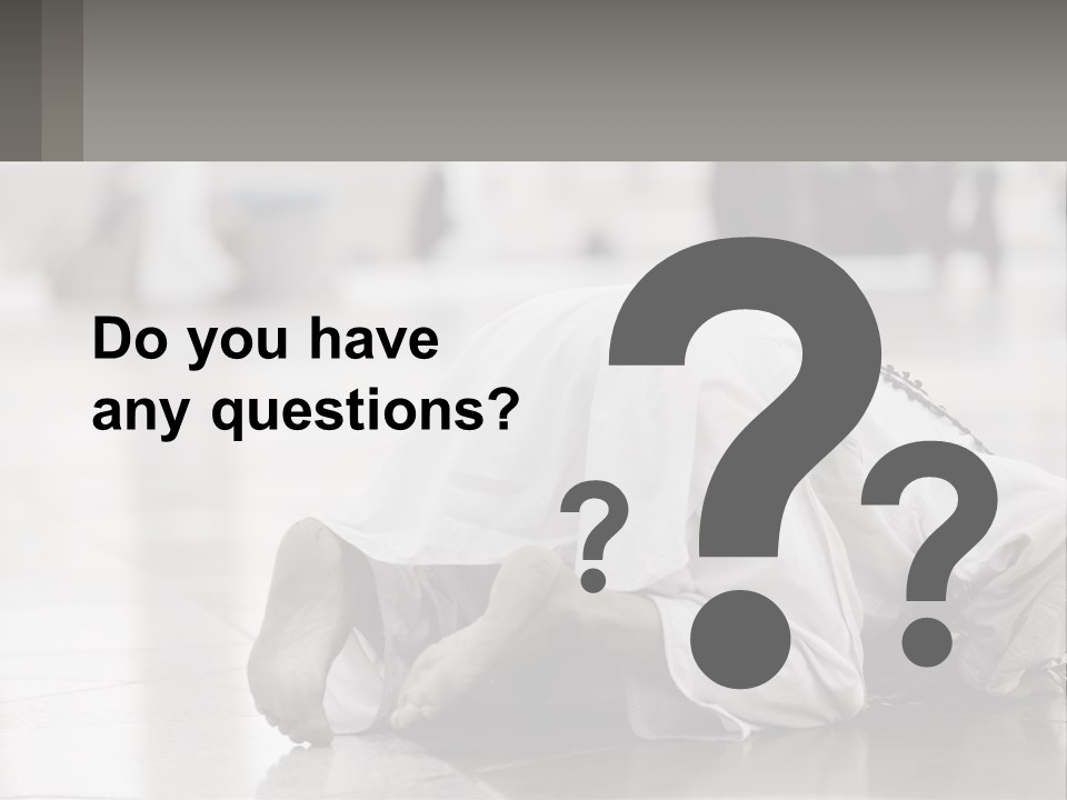 A Man Laying On The Ground With His Head In His Hands PowerPoint Template