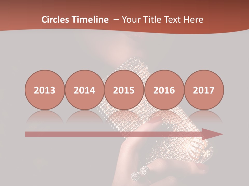 A Woman Holding A Cell Phone In Her Hand PowerPoint Template