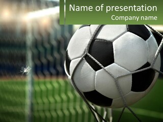 A Soccer Ball In A Net On A Soccer Field PowerPoint Template