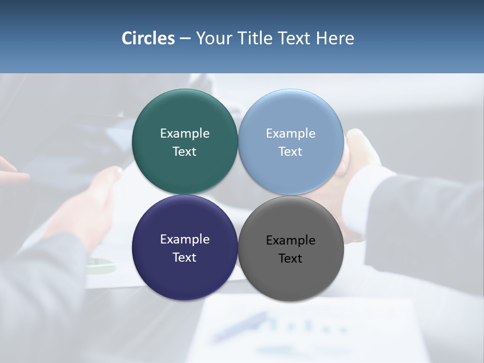 Two Business People Shaking Hands Over A Table PowerPoint Template