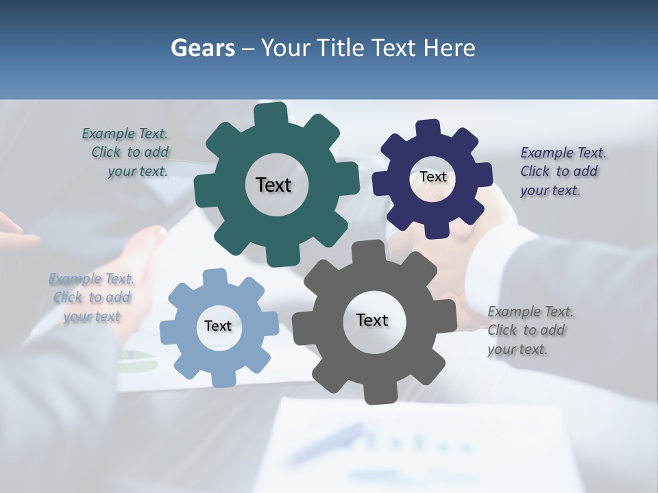 Two Business People Shaking Hands Over A Table PowerPoint Template