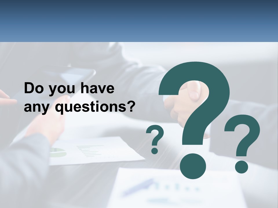 Two Business People Shaking Hands Over A Table PowerPoint Template