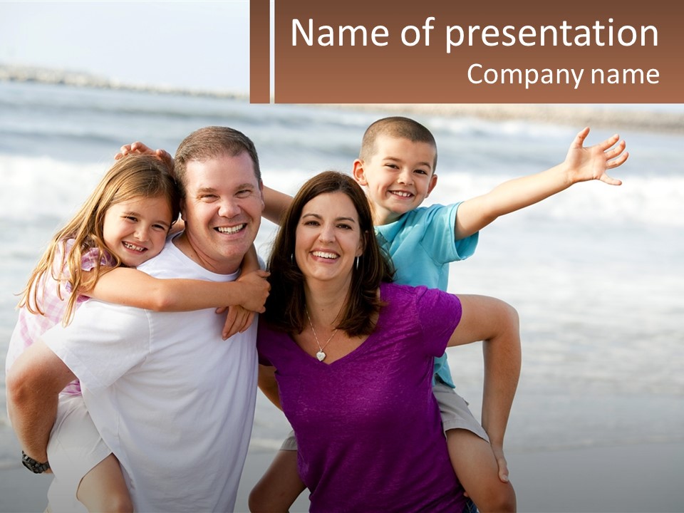 A Family Posing For A Picture On The Beach PowerPoint Template