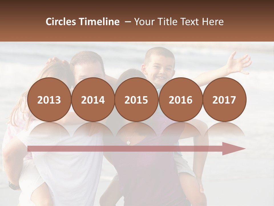 A Family Posing For A Picture On The Beach PowerPoint Template