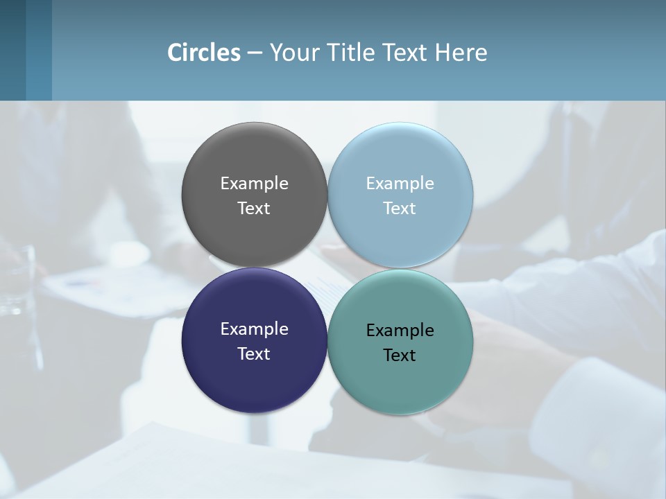 A Group Of People Sitting Around A Table With A Tablet PowerPoint Template