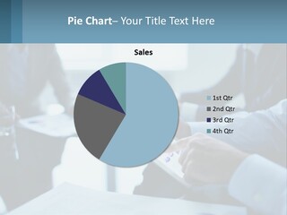 A Group Of People Sitting Around A Table With A Tablet PowerPoint Template