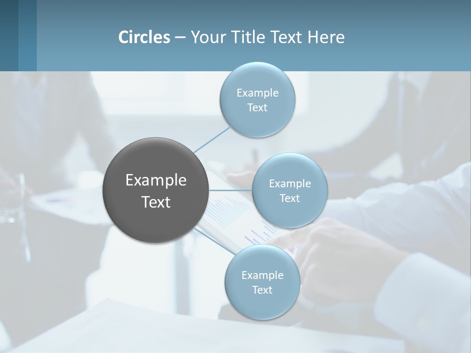 A Group Of People Sitting Around A Table With A Tablet PowerPoint Template