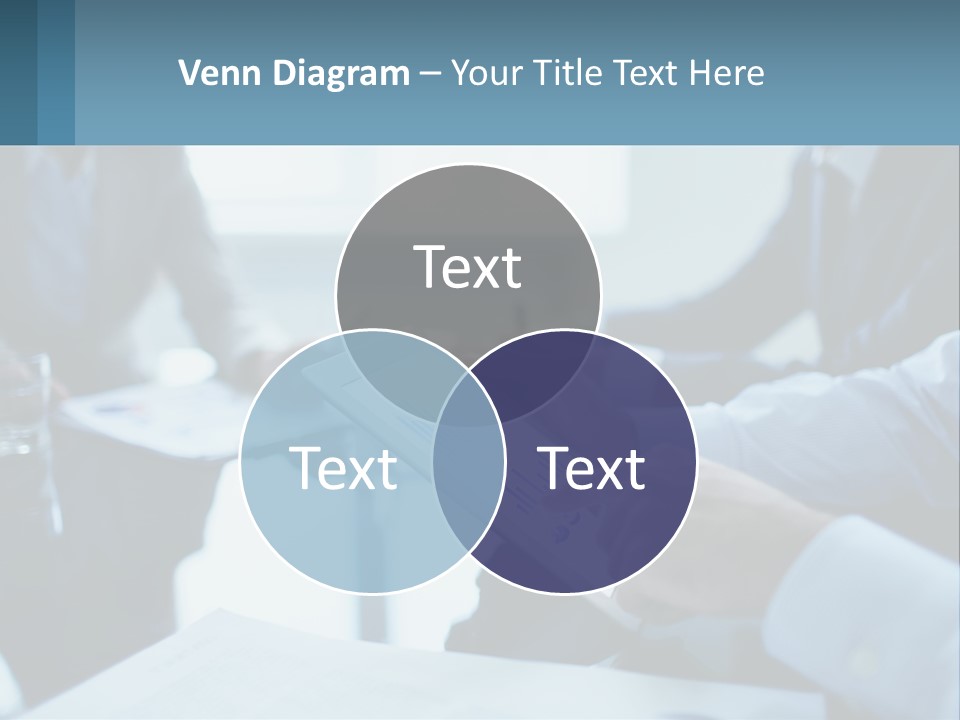 A Group Of People Sitting Around A Table With A Tablet PowerPoint Template