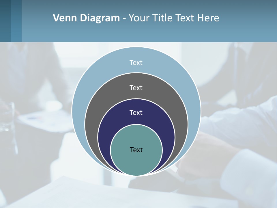 A Group Of People Sitting Around A Table With A Tablet PowerPoint Template