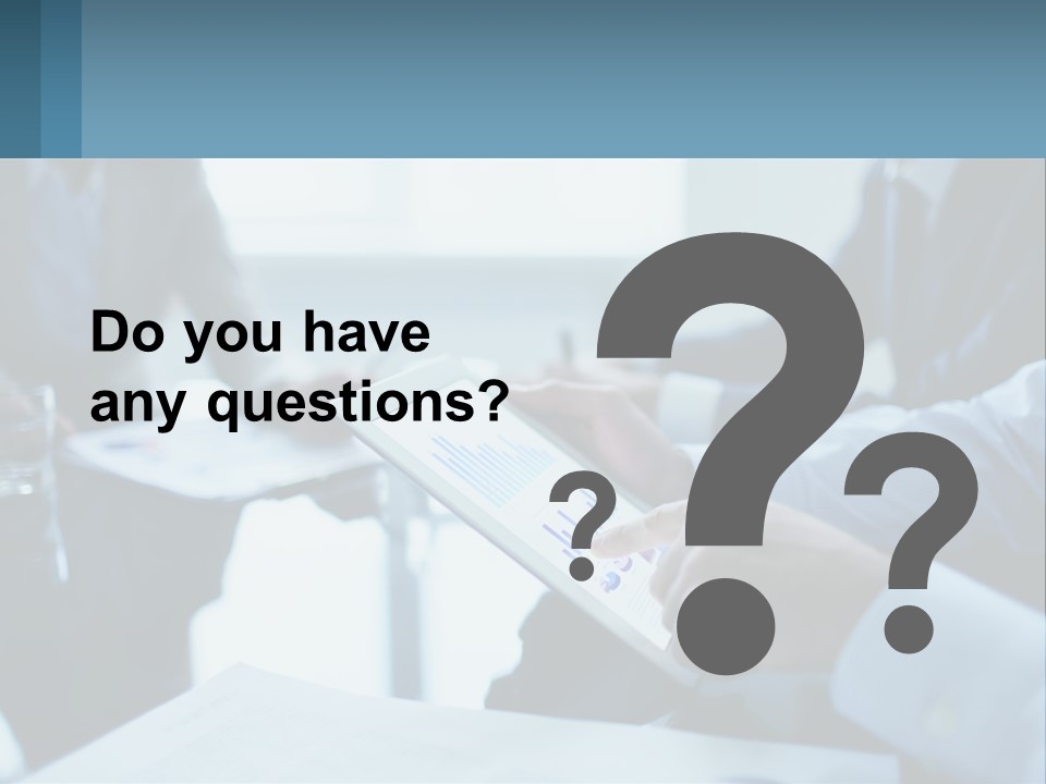 A Group Of People Sitting Around A Table With A Tablet PowerPoint Template