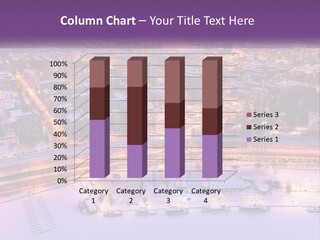 An Aerial View Of A City At Night PowerPoint Template